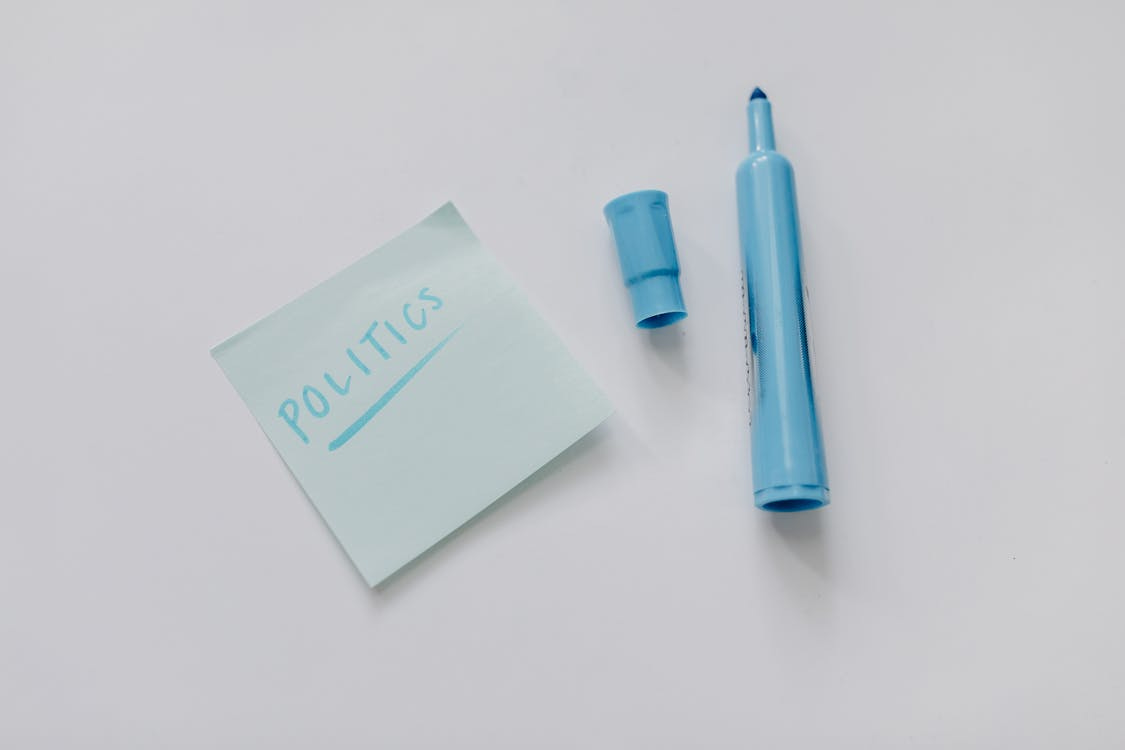Free White Sticky Note Beside Blue Pen Stock Photo