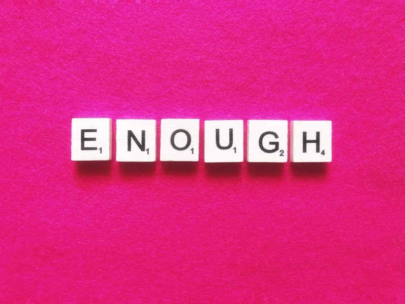 Text squares read “enough” against a magenta background.