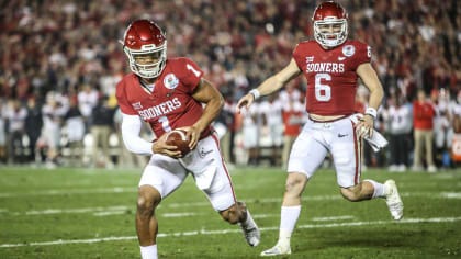 Oklahoma quarterback Baker Mayfield (6) after handing the ball off to his backup, Kyler Murray (1), during a play at the 2018 Rose Bowl. Mayfield and Murray will face each other in the NFL for the first time Sunday when the Browns visit the Cardinals.
