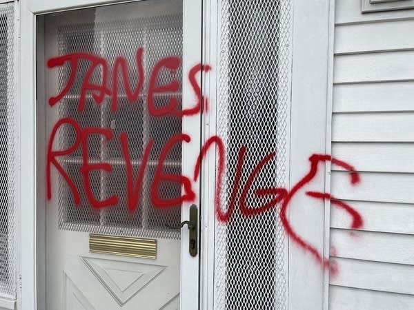 Red spray paint reads Janes Revenge