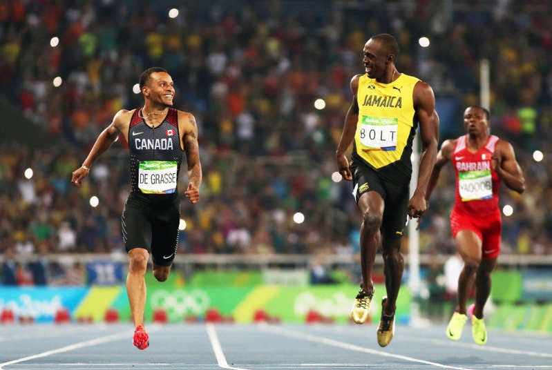 Andre De Grasse et al. watching a football ball: ‘It’s pretty cool to line up against the fastest human being ever' - Getty Images