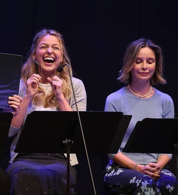 Melissa laughing and Calista trying not to