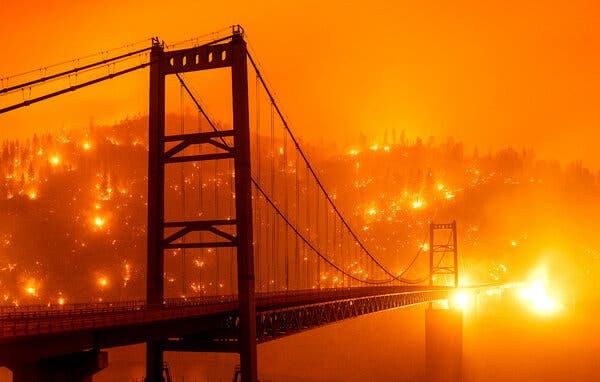 The Bear Fire burned on Wednesday on a hillside near the Bidwell Bar Bridge in Oroville, Calif.