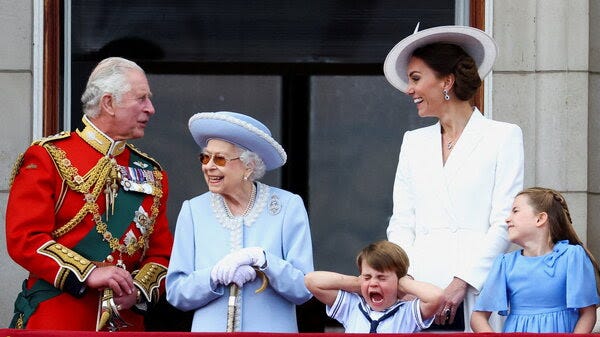 Britain's Queen Elizabeth II, Prince Charles and Catherine, Duchess of Cambridge, along with Princess Charlotte and Prince Louis appear on the balcony of Buckingham Palace as part of the Trooping the Color parade during the queen's Platinum Jubilee celebrations.