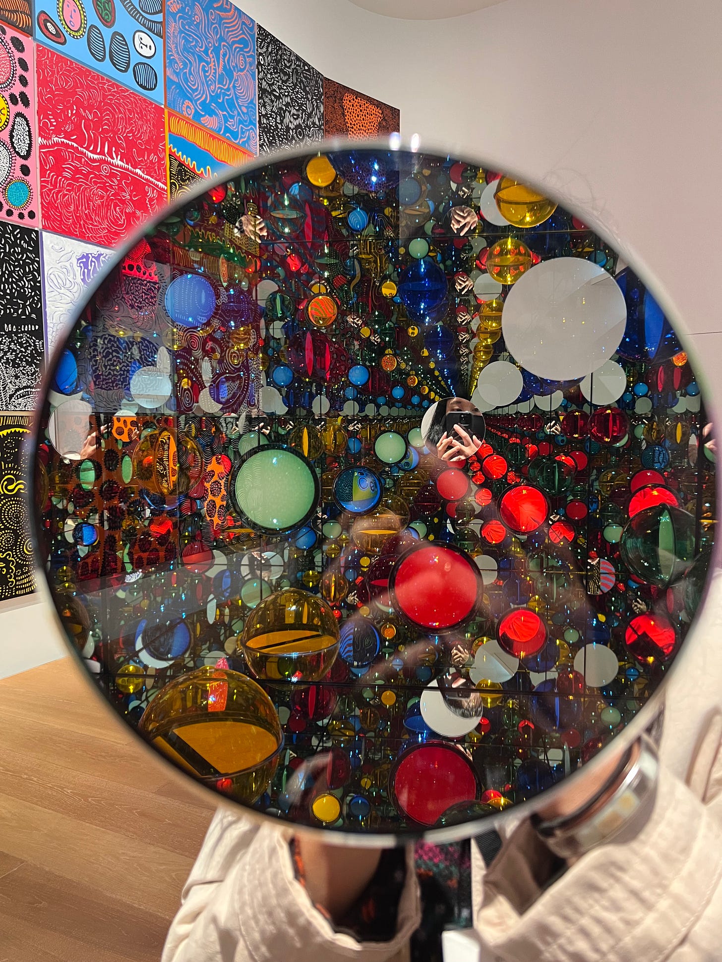 a person framing a kaleidoscopic circle
