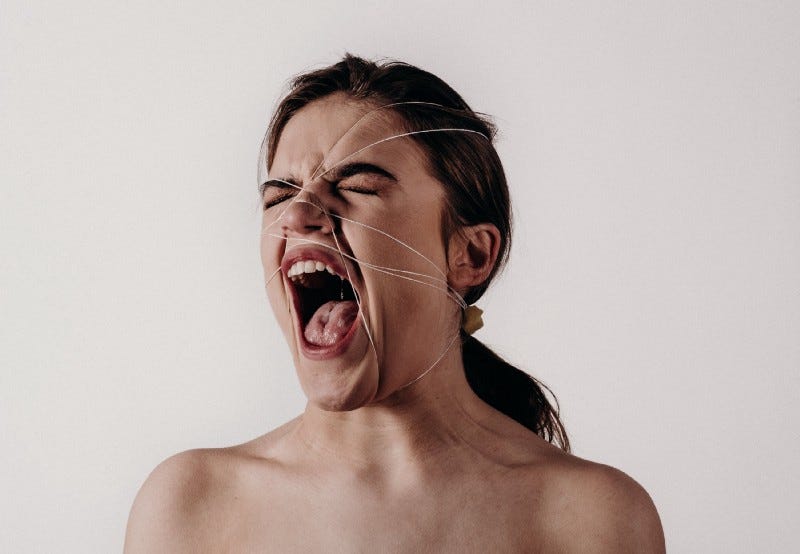A woman screams in anger