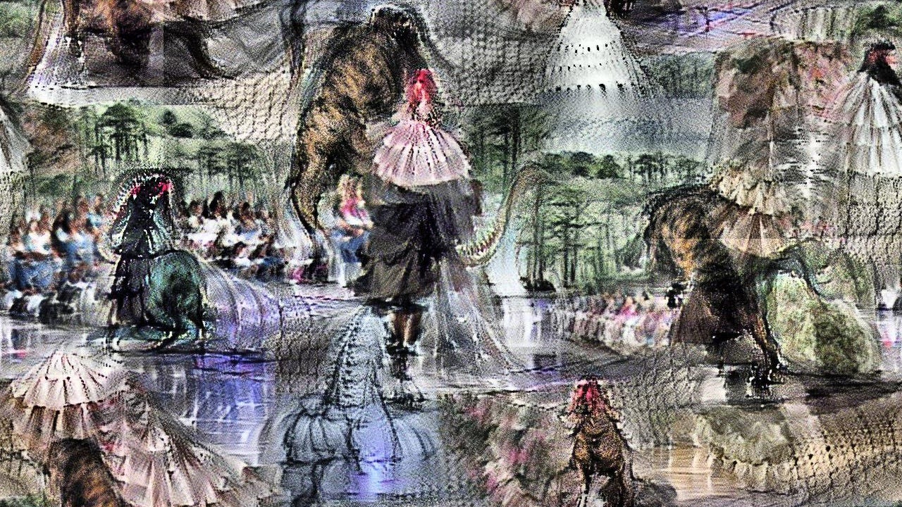 The tyrannosaurus isn't identifiably *in* the dress per se, but there are many tiered floofy white dresses, and strong hints of tyrannosaurus legs and tails, and nice Cretaceous trees in the background. Crowds line the runway.