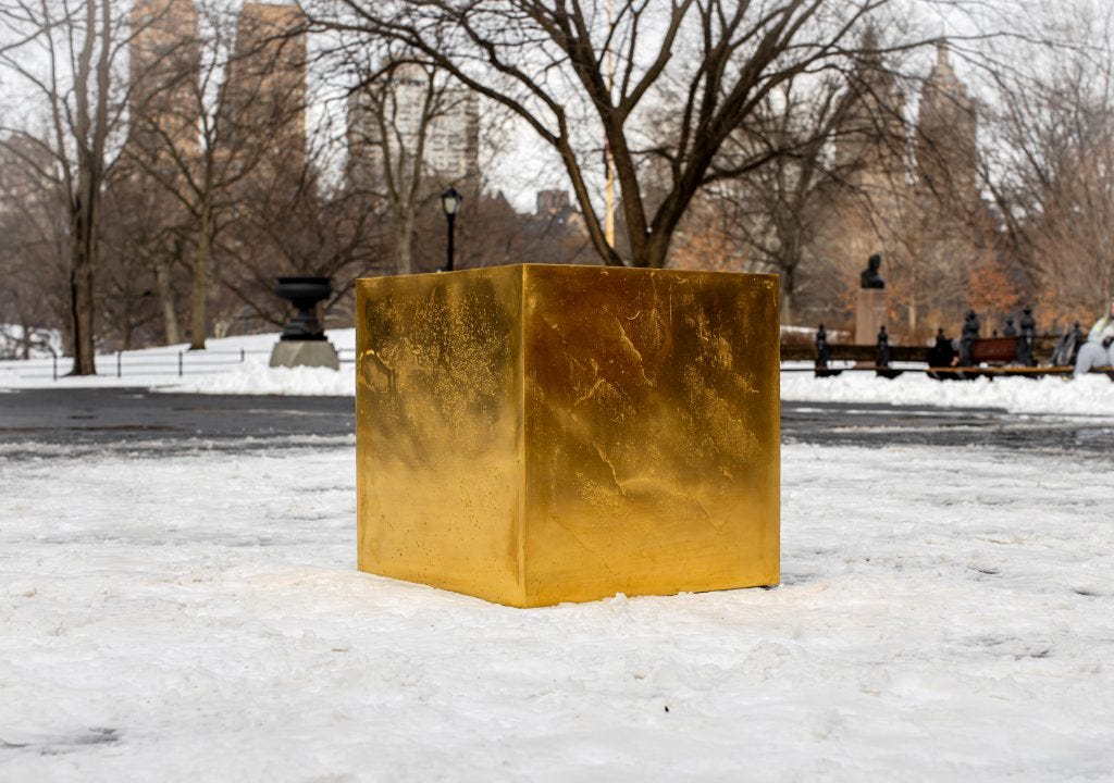 The gold cube in Central Park yesterday, in a forced perspective that makes it look big, though it is not.
