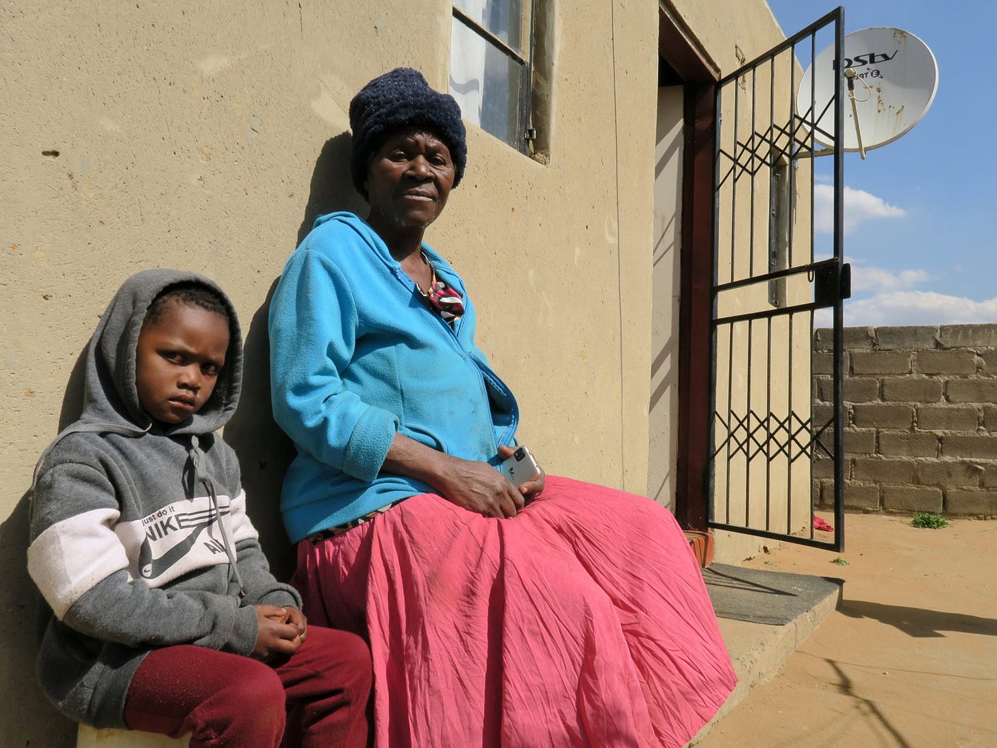 Lettie Mdluli and her grandchild