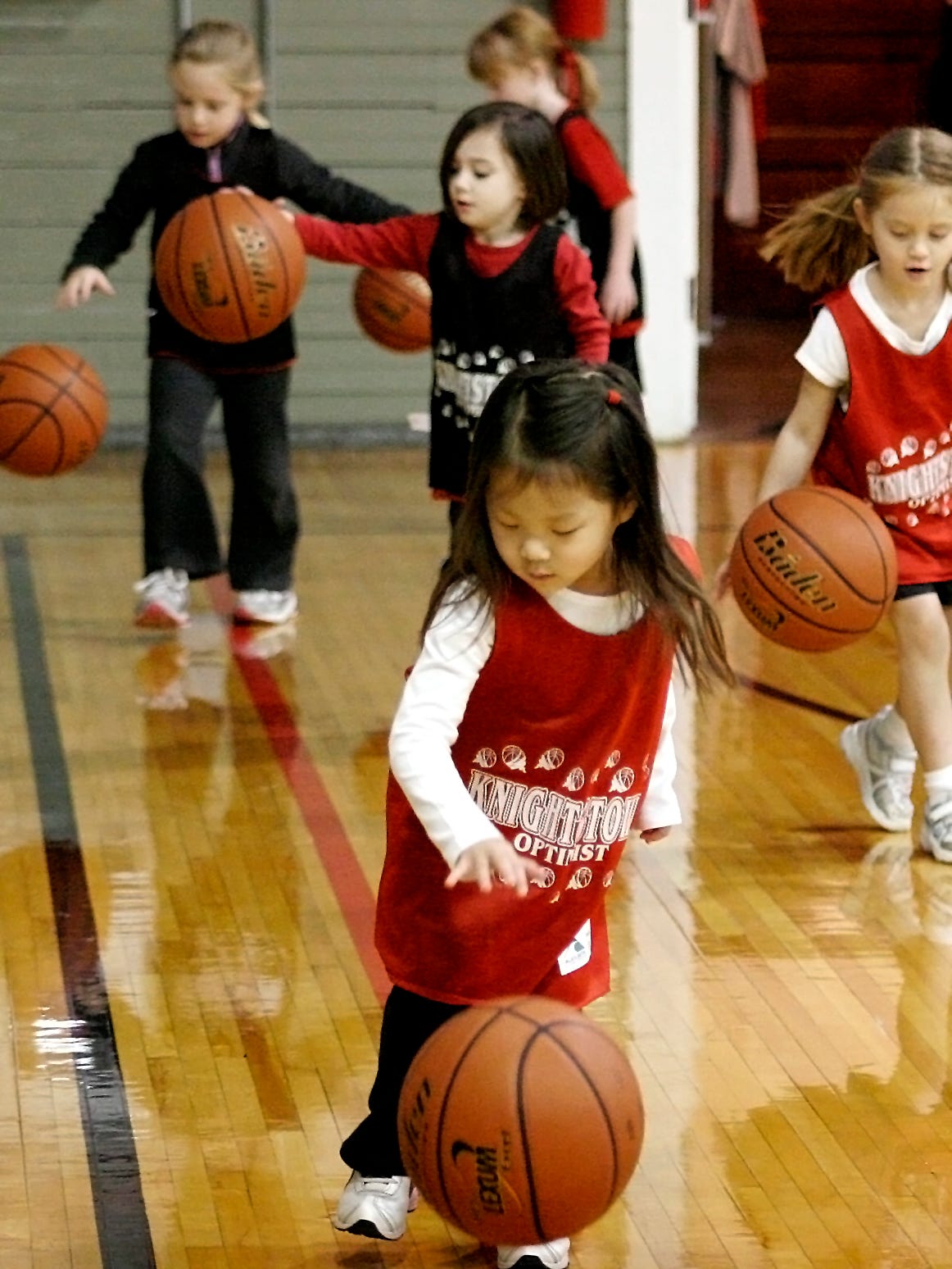 Little kids learning the fundamentals of basketball just seems so right in a place like the Hoosier Gym. Here, Optimist Club youngsters practice their dribbling skills. Feelings of Hoosier pride swell up for most people when they enter the gym - even for non-Hoosiers!