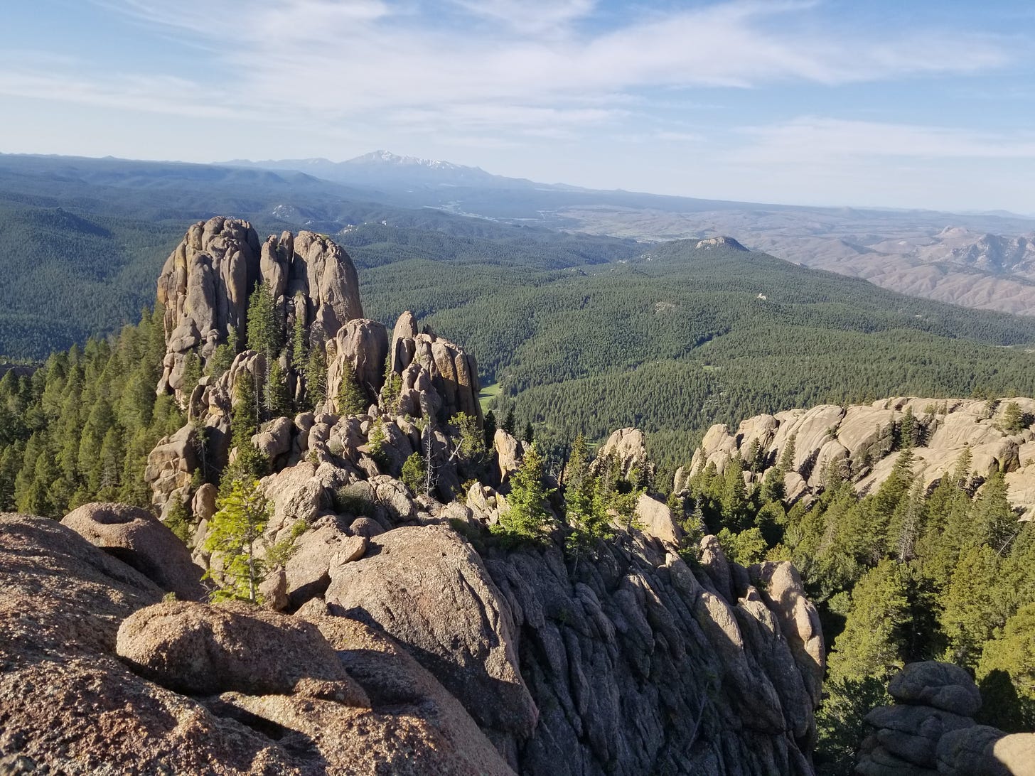 rock formations rise from the forest at Devil's Head lookout