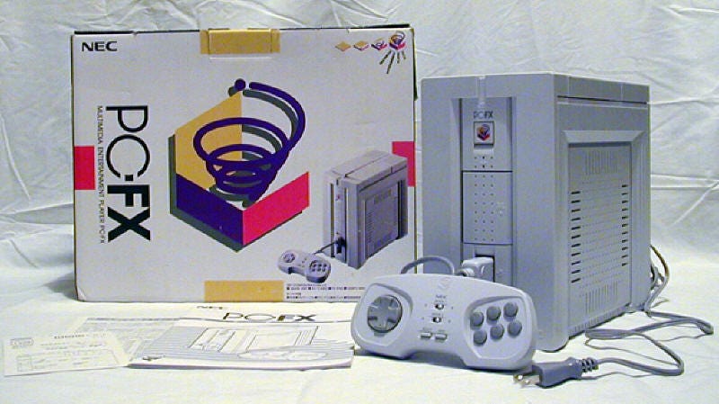 A photo of the ahead-of-its-time tower-shaped PC-FX system, and its box