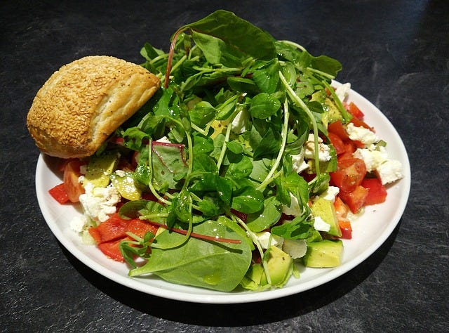 salad with avocado and arugula