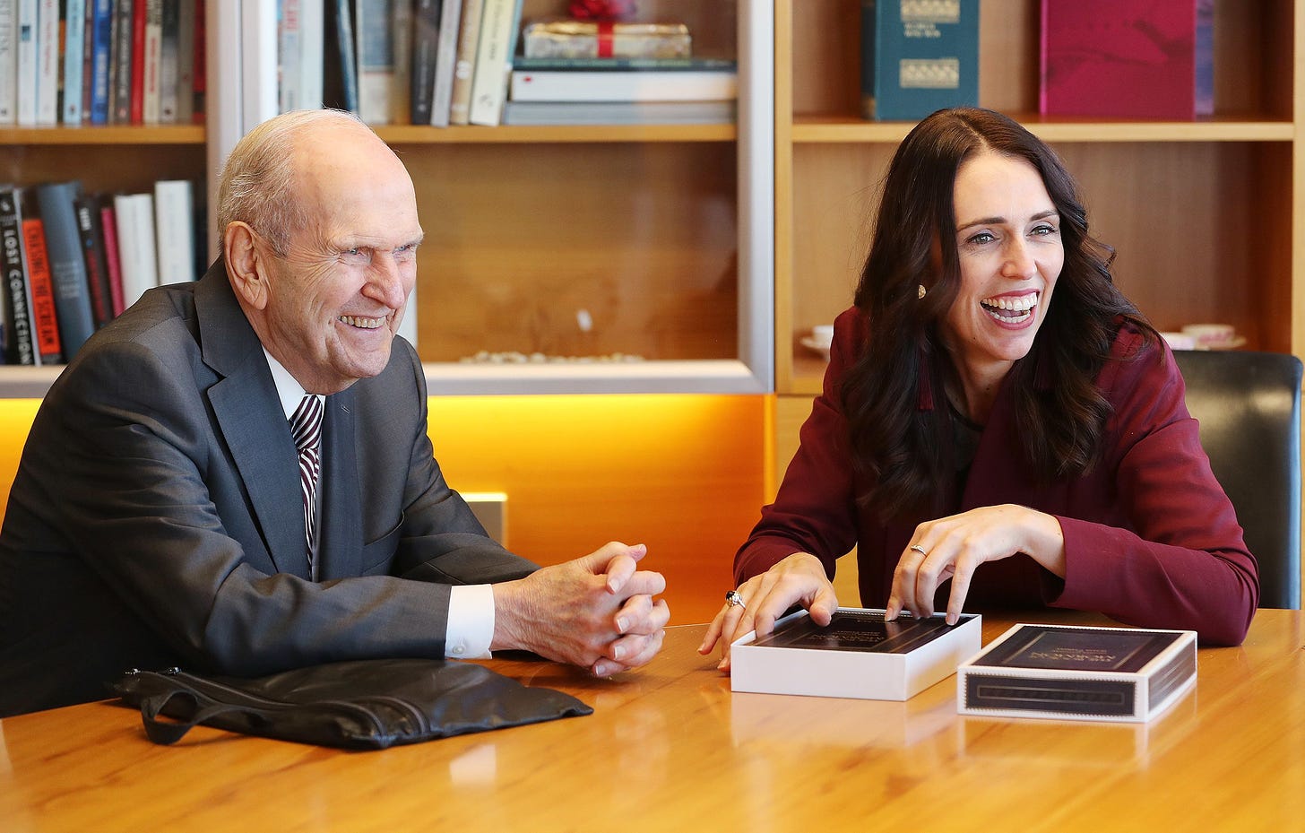 President Russell M. Nelson of The Church of Jesus Christ of Latter-day Saints gives a Book of Mormon to New Zealand Prime Minister Jacinda Ardern in Wellington, New Zealand, on Monday, May 20, 2019.