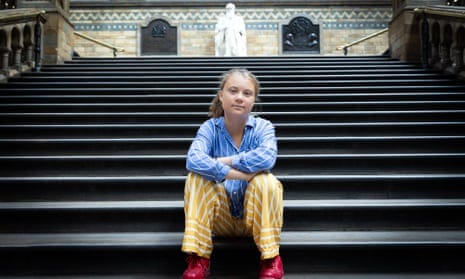 Greta Thunberg in front of the statue of Charles Darwin at London’s Natural History Museum, June 2022.