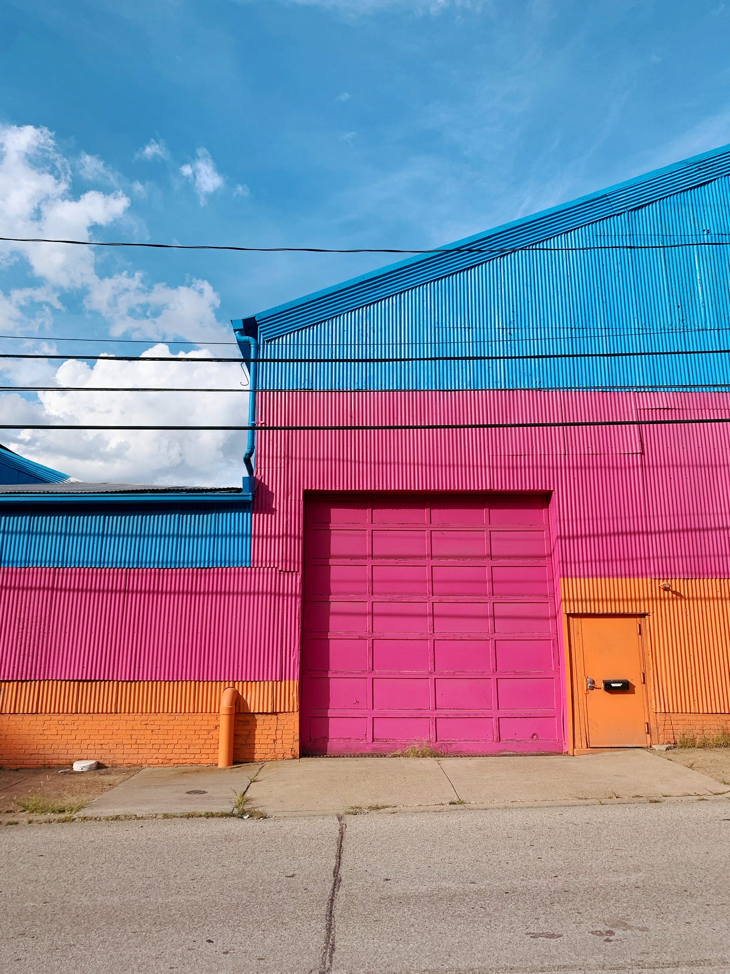 Very colorful (blue, pink, orange) warehouse