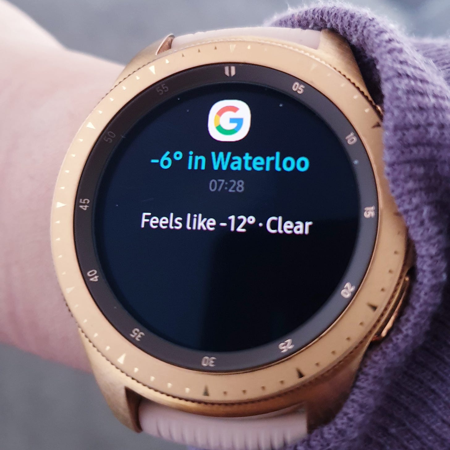 A smartwatch displays temperature in Waterloo at 07:28 to be -6 Celsius but feels like -12 degrees.
