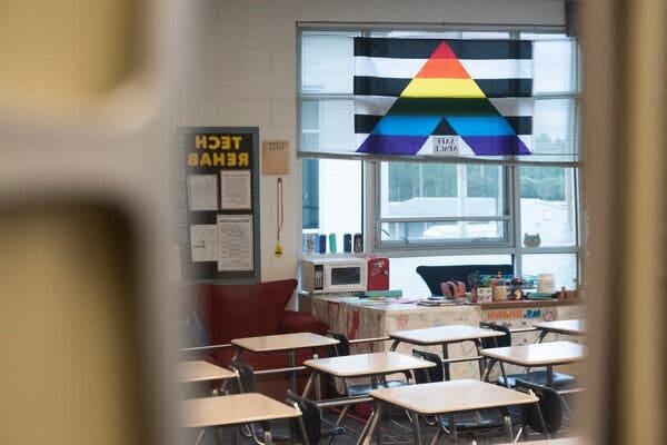 A straight ally flag, signally L.G.B.T.Q. support, hangs at a school in St. Johns County, Fla. But a gay pride flag was no longer on full display.