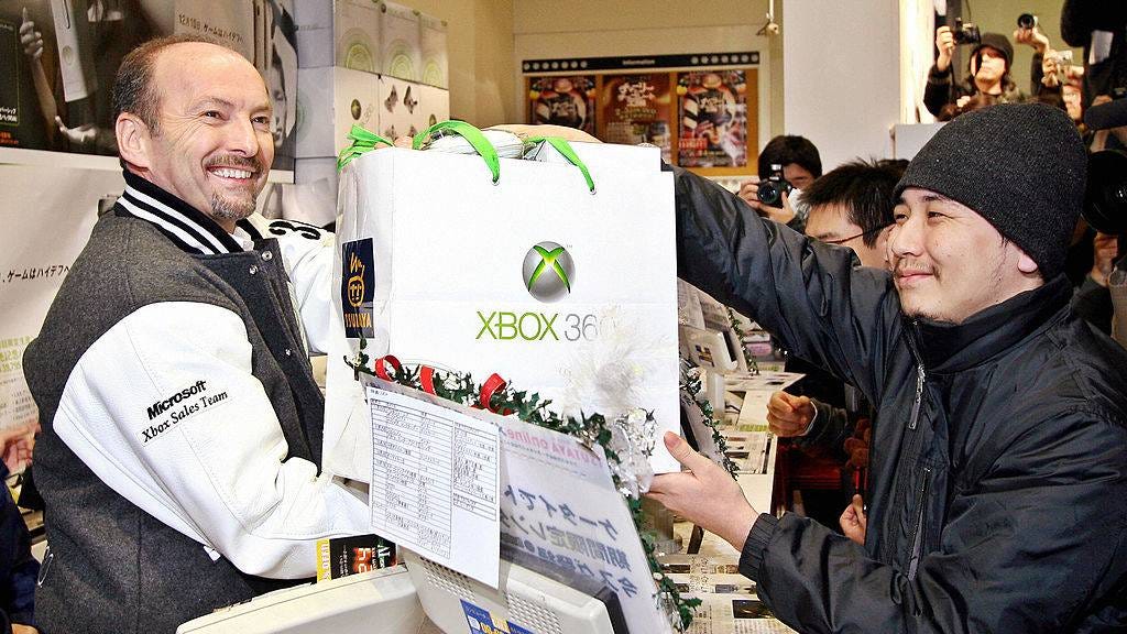 Peter Moore selling an Xbox 360 in Japan