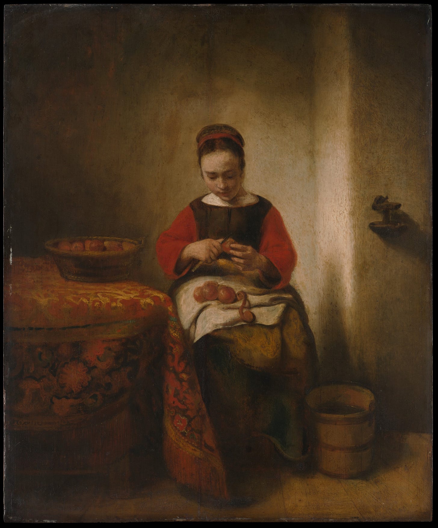 A young housemaid seated next to a richly clothed table looks down at the apple she is peeling.