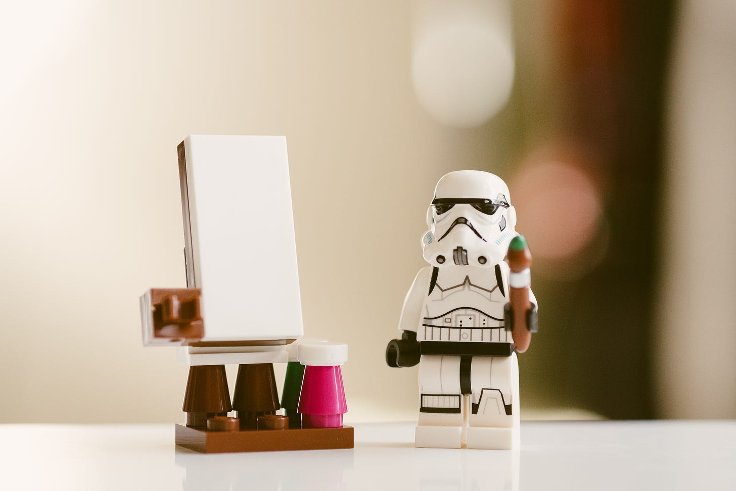Lego Stormtrooper stands in front of blank canvas
