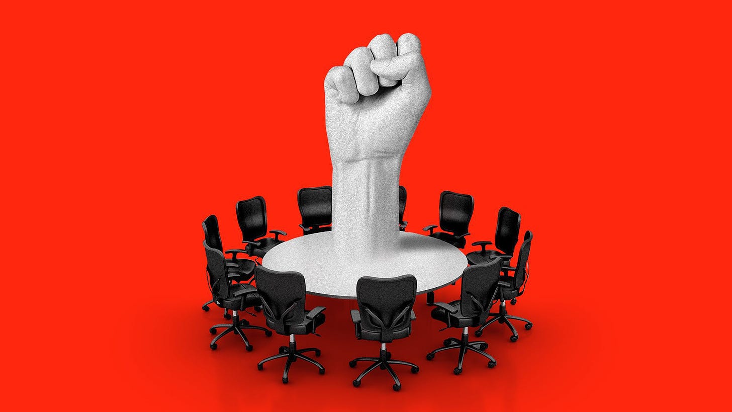 Illustration of a fist emerging from a meeting table. 