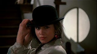 still image from movie: The Unbearable Lightness of Being, woman wearing a bowler hat