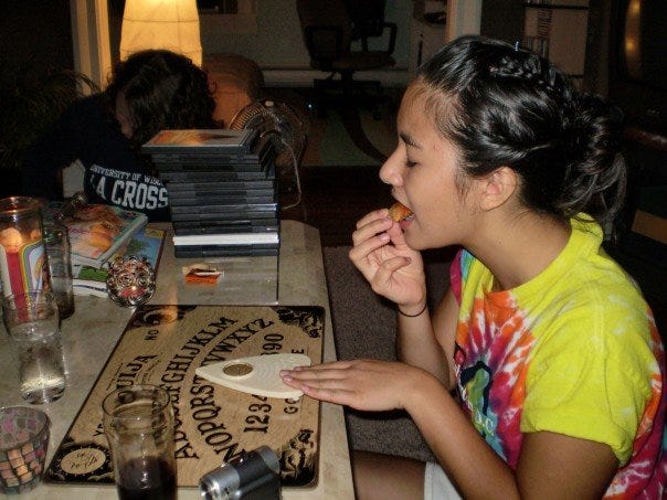 high school me eating a pizza roll and using a ouija board