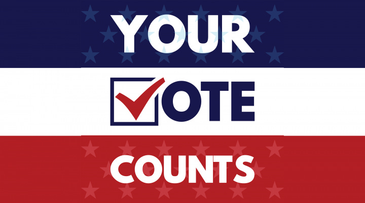 Red, white, and blue sign that reads "Your Vote Counts"