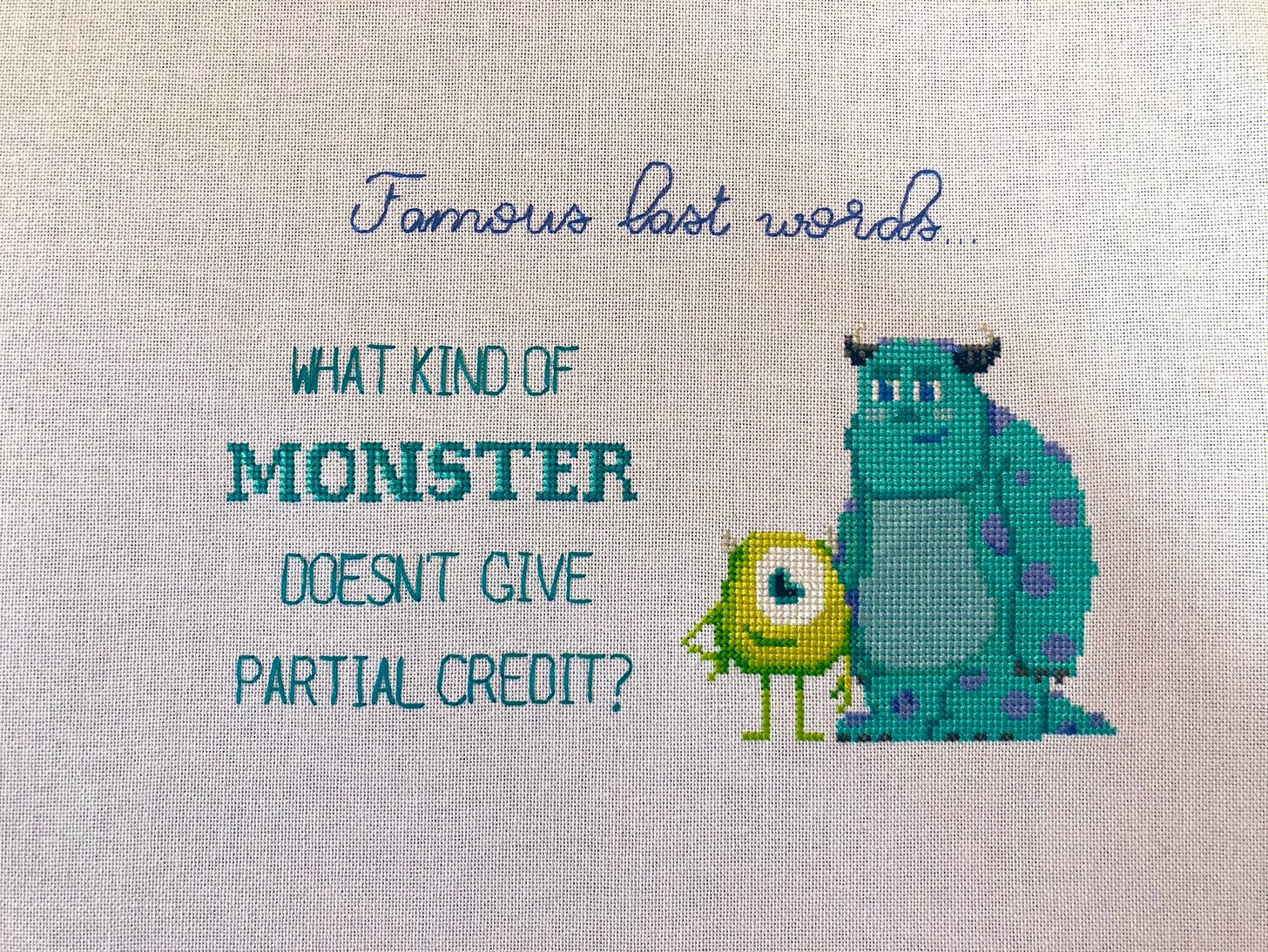 Cross-stitch that says "Famous last words: What kind of monster doesn't give partial credit?"