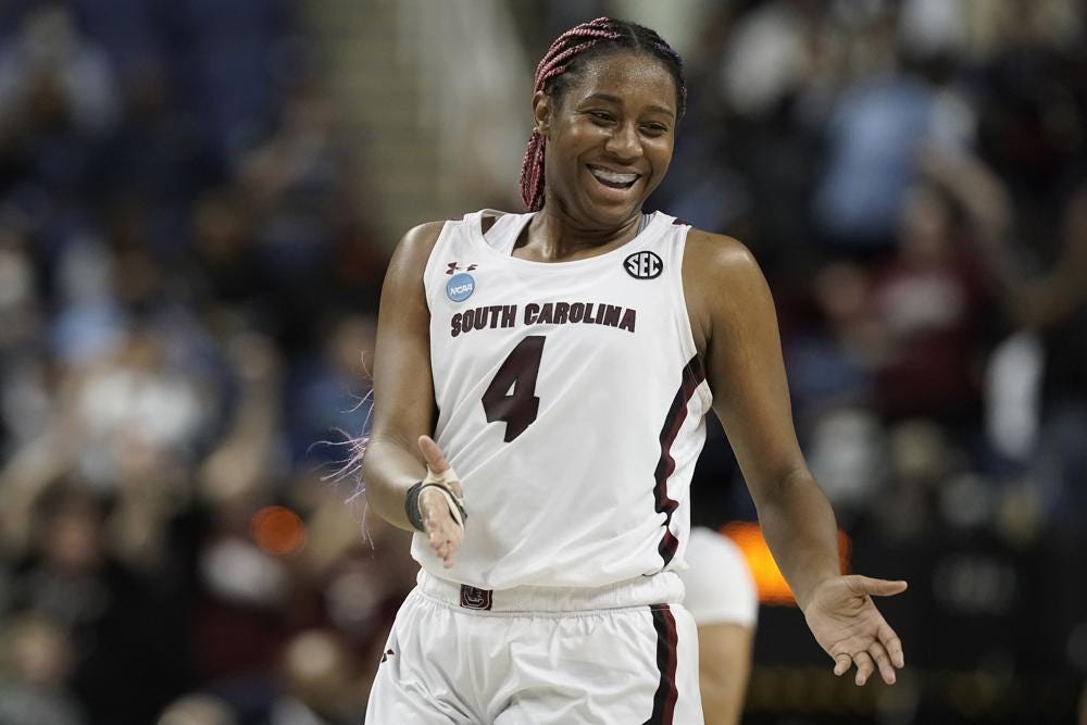 South Carolina forward Aliyah Boston reacts following a college basketball game against North Carolina in the Sweet 16 round of the NCAA women's tournament in Greensboro, N.C., Friday, March 25, 2022. (AP Photo/Gerry Broome)