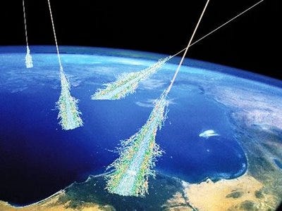 Cosmic rays hitting the earth (illustration)