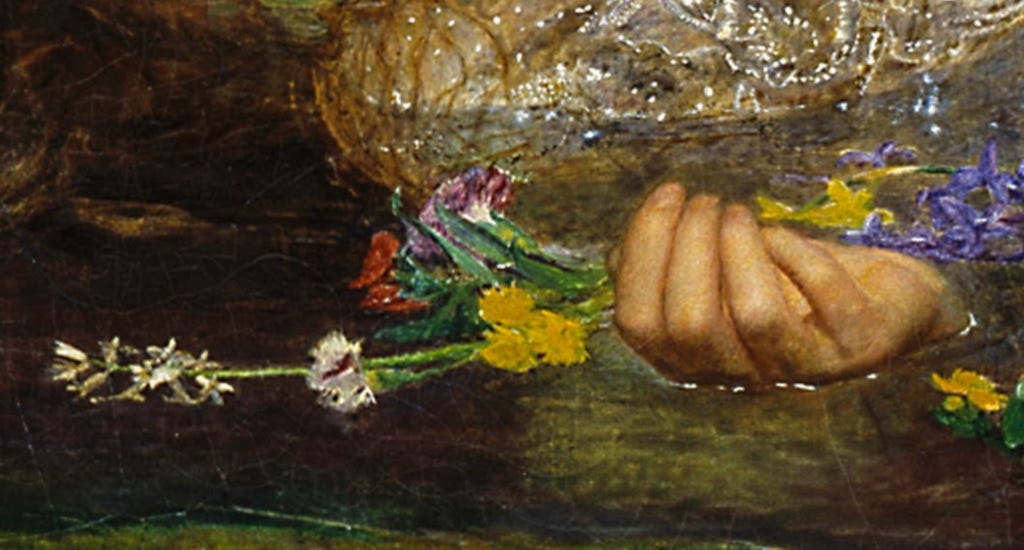 A close-up of Ophelia's hand in Millais' famous painting of Ophelia. Her hand floats in the water holding a handful of multi-coloured flowers.