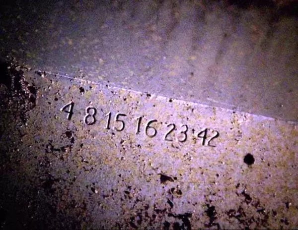 A close up of the numbers stamped into the hatch. They are: 4, 8, 15, 16, 23, 42.