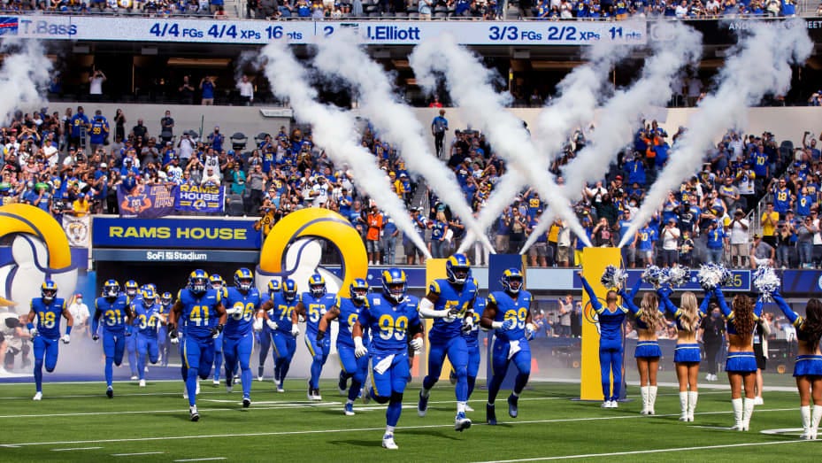 Los Angeles Rams defensive end Aaron Donald #99 leads the defense onto the field to play the Arizona Cardinals at SoFi Stadium in Inglewood on Sunday, October 3, 2021.