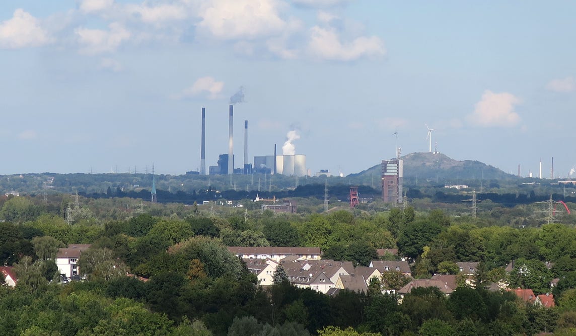Ruhr landscape with smoke stacks and windmills