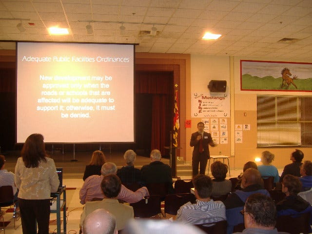 A slide with his definition of an APFO, which I'll go through in the body of the story. The slide reads, 'New development may be approved only when the roads or schools that are affected will be adequate to support it; otherwise, it must be denied.'