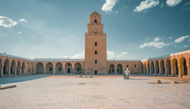 The minaret of the Great Mosque of Kairouan as shown from inside the courtyard. (Monaambf / CC BY-SA 4.0)