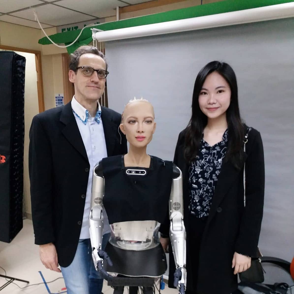 May be an image of 3 people, people standing and indoor
