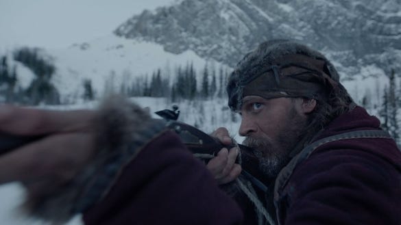 Tom Hardy takes aim in 2015's "The Revenant," a 20th Century Fox release.