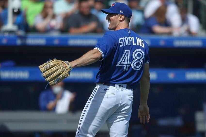Blue Jays starter Ross Stripling reacts after an out at the plate helped his cause in the third inning of Saturday’s win over the Astros in Buffalo.