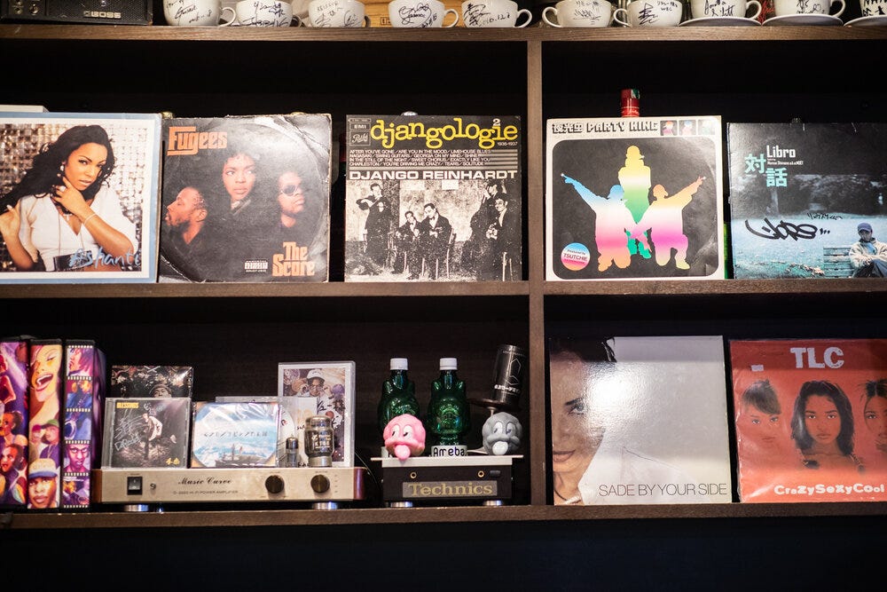 The back wall of Reissue Cafe features some classic hits.