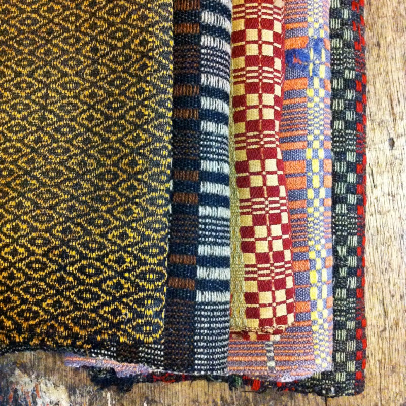 Stack of colourful textiles