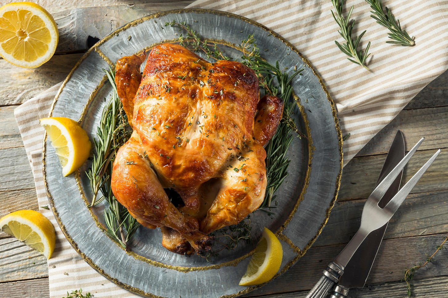 Roasted whole chicken with herbs and lemons