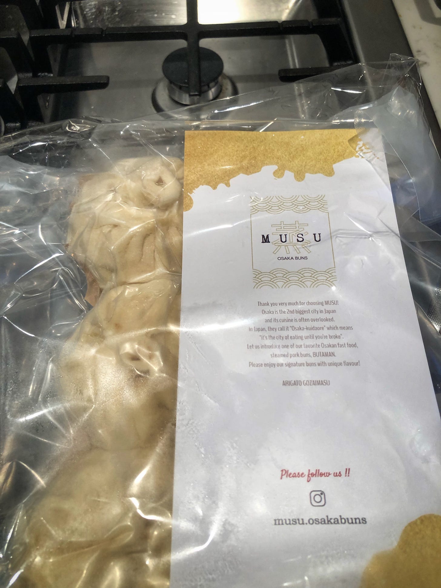 A package of 6 frozen pork buns in a package that reads "Musu Osaka Buns"