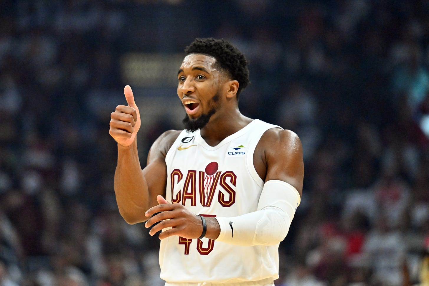CLEVELAND, OHIO - OCTOBER 23: Donovan Mitchell #45 of the Cleveland Cavaliers reacts during the second quarter against the Washington Wizards at Rocket Mortgage Fieldhouse on October 23, 2022 in Cleveland, Ohio. 