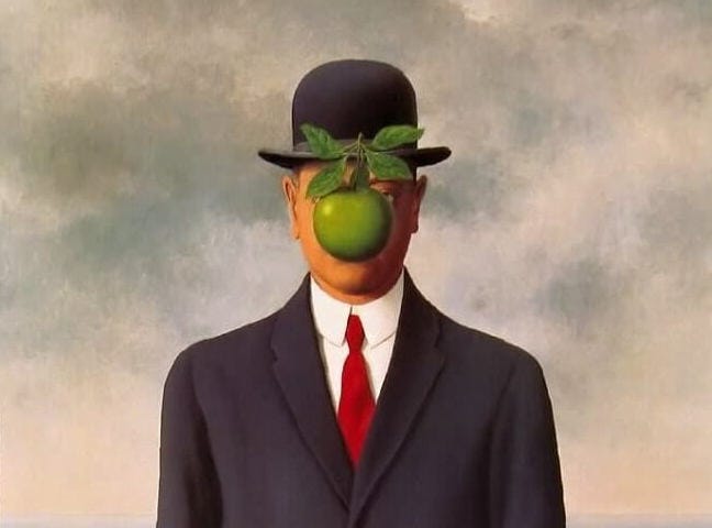 Magritte's painting of a businessman with an apple obstructing his face.