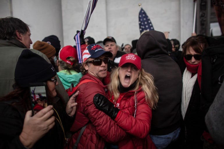 Hundreds of supporters of President Trump besieged the Capitol on Wednesday in what House of Representatives Speaker Nancy Pelosi described as 'an armed insurrection against America' [Ahmed Gaber/Reuters]