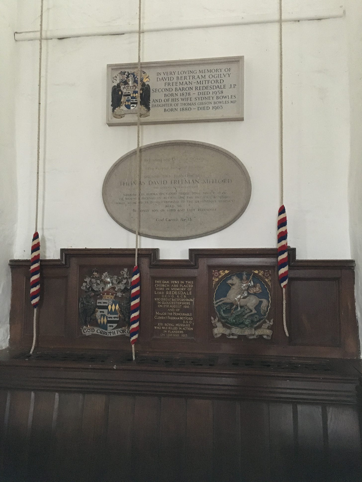 Plaques to the Mitford family in St. Mary's, Swinbrook