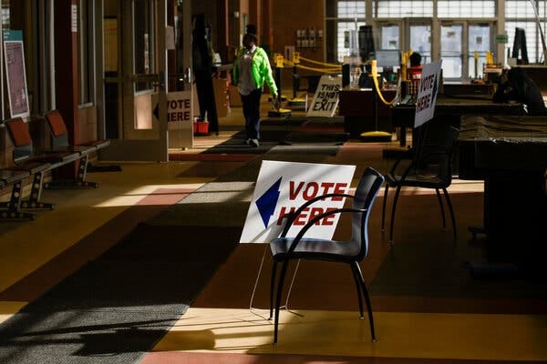 A voter entering a precinct in Detroit during the midterm elections. 